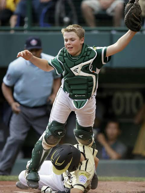 Eastlake Little League player Dalton Chandler fielding a ground ball in 2013